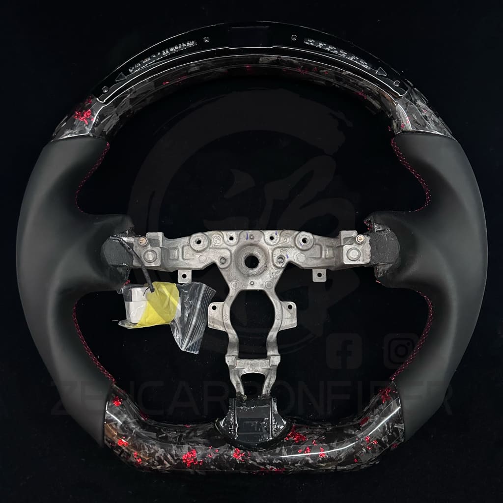 2009+ Nissan 370Z/Juke/09-14 Maxima Carbon Fiber Steering Wheel