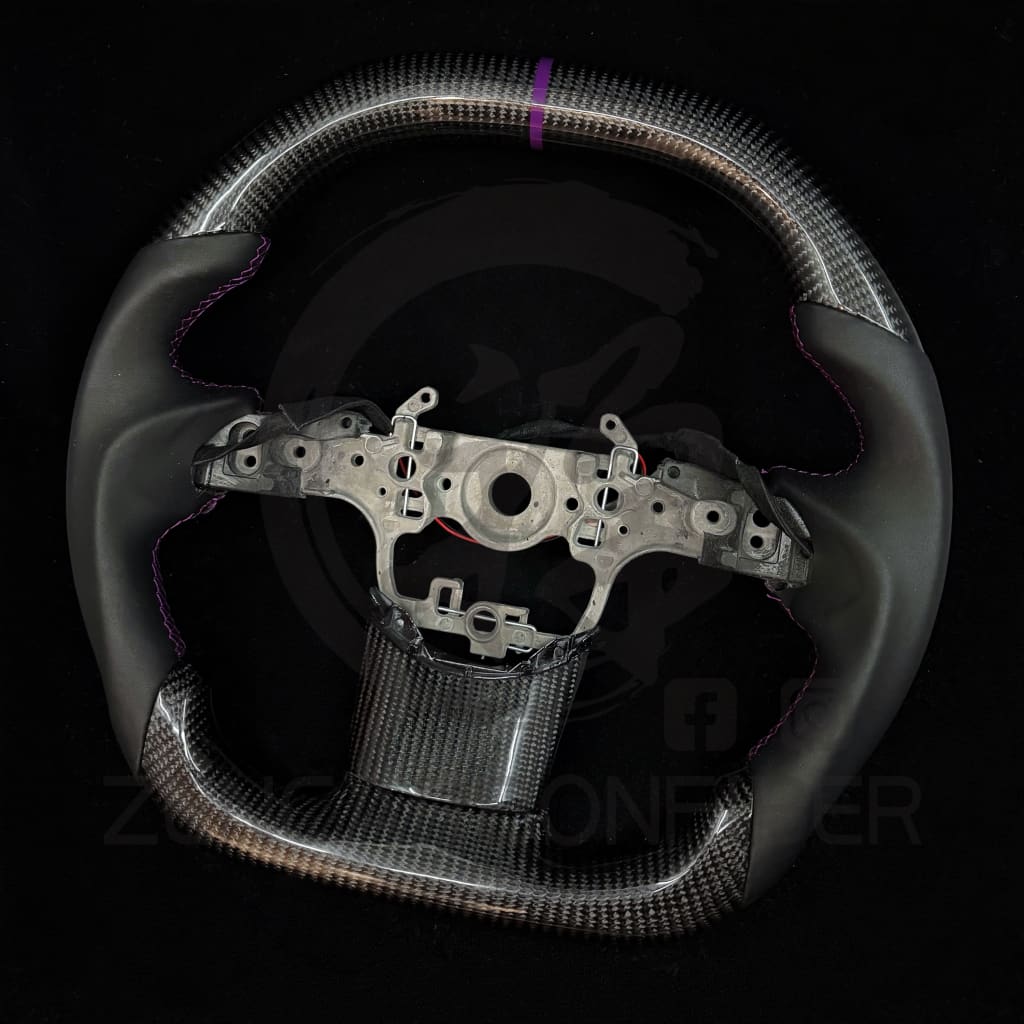 2023+ Toyota GR Corolla Carbon Fiber Steering Wheel
