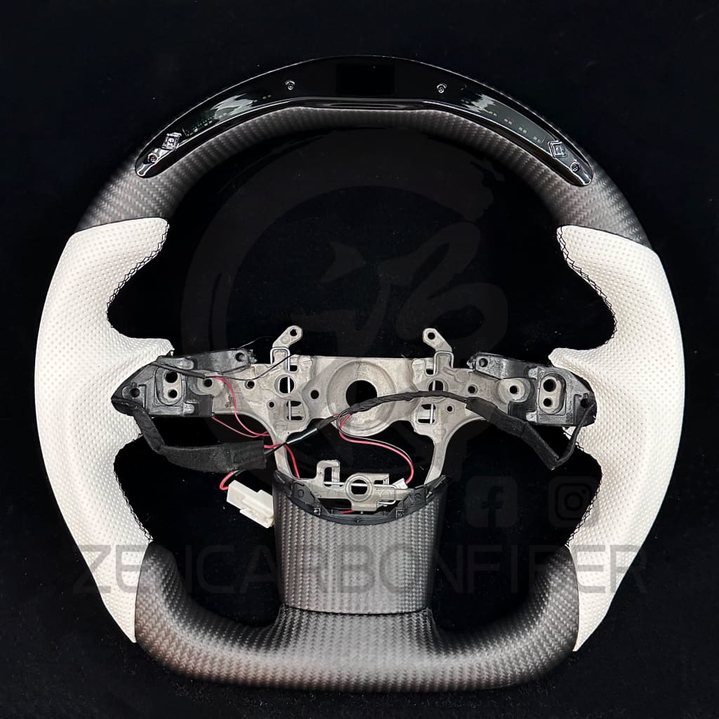 2023+ Toyota GR Corolla Carbon Fiber Steering Wheel