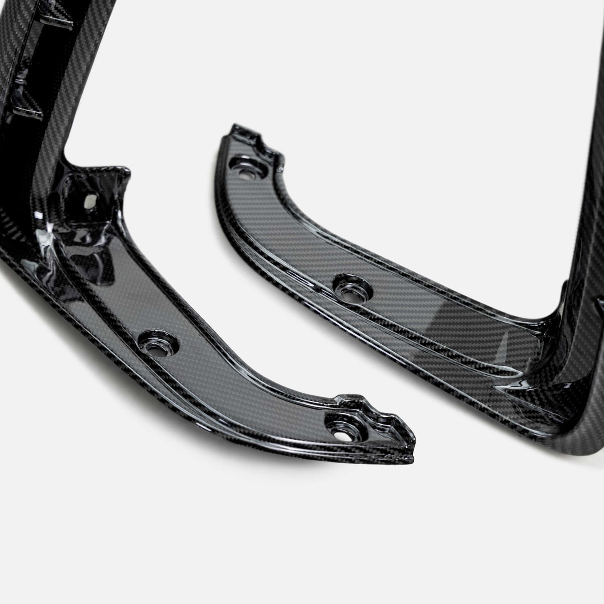 Type-OE carbon fiber tail light surrounds for 2021-2024 RAM TRX and 2025 RHO (Pair)